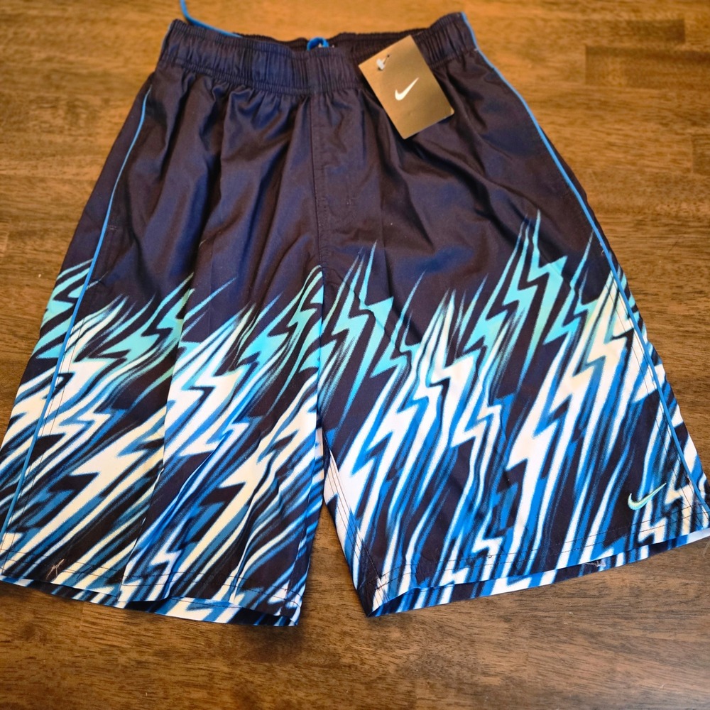 Nike Boys Lightning Bolt Swim Trunks Navy Blue Cyan Mesh Lined Size Medium NWT